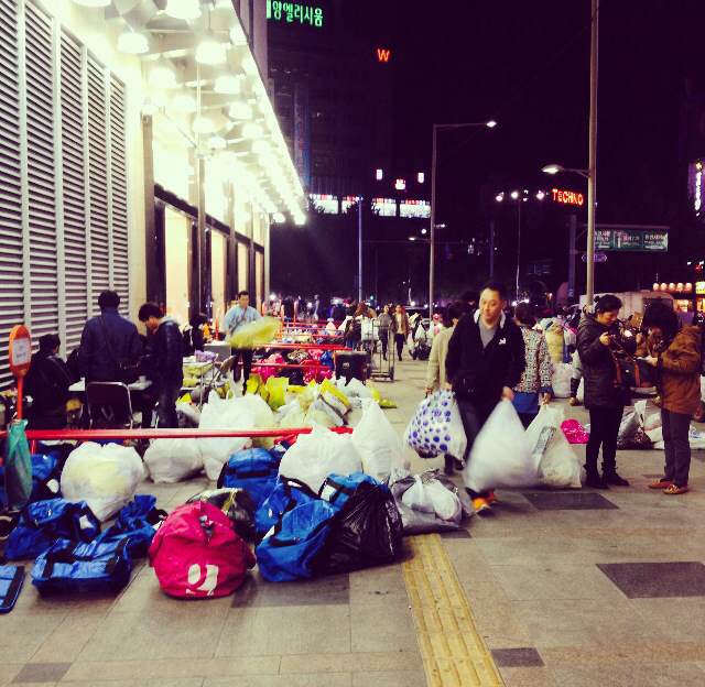 The streets in front of the malls in Dongdaemun were lined with bags and bags of clothing, shoes, bags and accessories purchased by locals at the wholesale markets. Many come to Seoul to purchase clothing in bulk and sell them in their provinces.