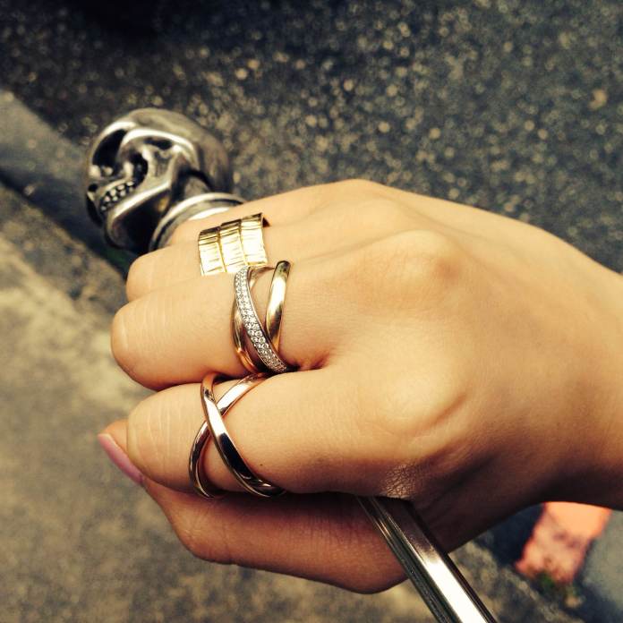 My McQueen umbrella doubles as a weapon. Wearing Edge of Ember, Carrie K & Cartier rings.