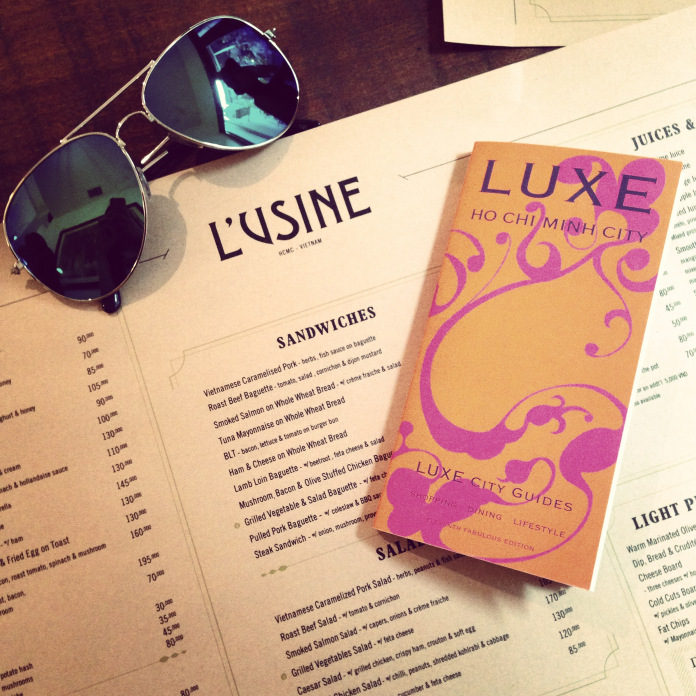 Escaping the rain with a LUXE guide and Vietnamese iced coffee in L'usine, Ho Chi Minh City, Vietnam.