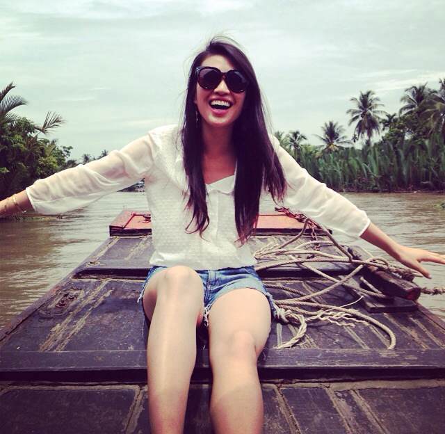 In my happy place: carefree, stress-free, outdoors. Sitting in a sampon going down Mekong River, Ho Chi Minh, Saigon, Vietnam.